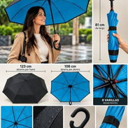 Sombrilla Inversa con Mango en C – 8 Varillas. Precio: 15 USD ¡Protégete de la lluvia con comodidad y estilo. - Img 58134909