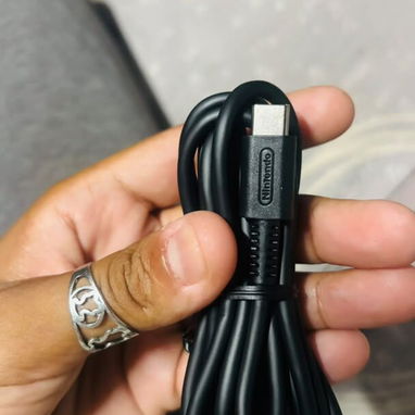 Se vende cargador original de nintendo switch 2 nuevo en su nailon - 5/7