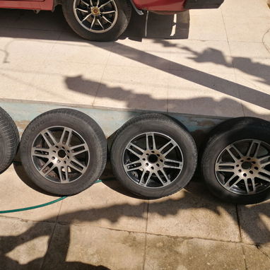 Juego de llantas con gomas ring 14 centro 4x100 y 4x108 - Img 116078870