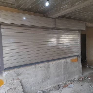 Se fabrican,instalan y automatizan puertas de garaje y protección de negocios - 8/9