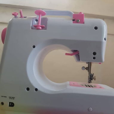 Maquina de coser eléctrica - 2/2