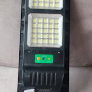 Lámpara solar con su panel. Su mando y base para montar Mide 65cm*22cm Precio: 40usd - Img 57289602