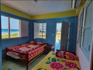 Renta casa frente al mar con 3 habitaciones,agua fría y caliente,piscina,barbecue,56590251 - Img main-image