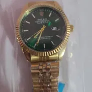 Reloj Rolex de cara verde - Img 57352392