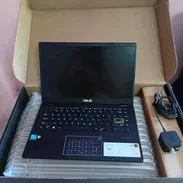 240USD Laptop Asus VivoBook Go 14 E410KA (COMO NUEVA)( 💯Funcionamiento + 💯Estética) - Img 58067406