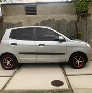 Vendo o negocio Kia picanto del 2009 automático - Img 48887905