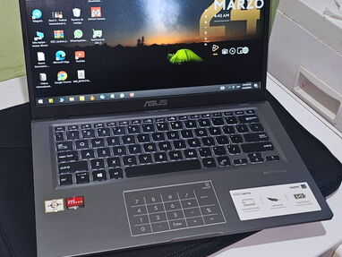 Laptop Asus  con muy poco uso y con garantía - Img main-image