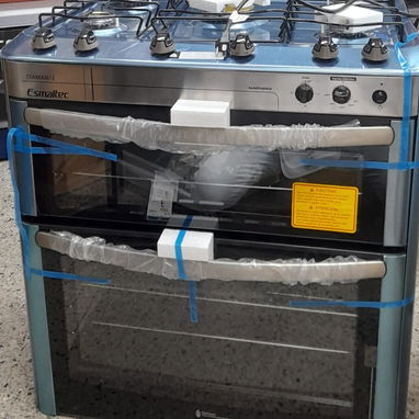 Cocina de doble horno eléctrico y de gas de 5 hornillas con magneto tapa de cristal luz en los hornos - 2/4