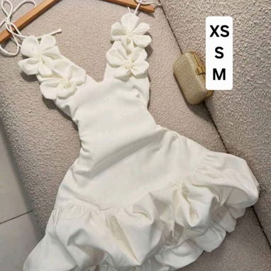 Variedad de vestidos largos y cortos - 5/5