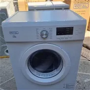 Secadora de ropa al vapor de 8 kilos electrica nueva en caja con papeles y garantía - Img 45697598