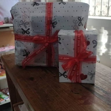 Regalos envueltos y empaques elegantes - 5/5