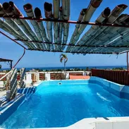 Reserva casa con piscina, billar, mirador, terraza para 15 personas en Guanabo con días disponibles - Img 55391080