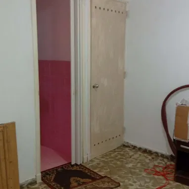 Vendo planta baja en el reparto Camilo Cienfuegos Pastorita 4 habitaciones 2baños y garage - Img 125932755