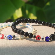 Pulseras en pareja piedra lunar, onix y ojos trucos - Img 52003902