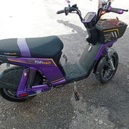 SE VENDE ¡NUEVA! TOPMAQ Evolution (Negro/Morado).  Panel digital, modo Eco, frenos de disco, doble amortiguador. ¡Solo - Img 57149615
