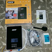 Calentador de agua, eléctrico de 110 v, instantáneo en linea. Rebajados de 110 a 100 usd - Img 55238245