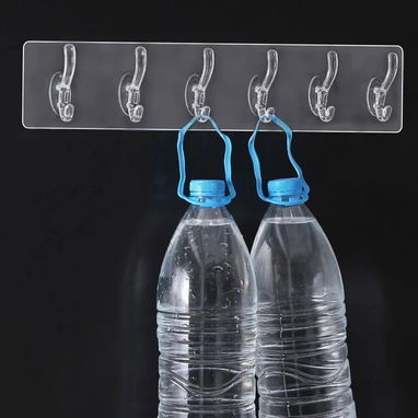 Adhesivo transparente pared con 6 ganchos para colgar utensilio. Flexible. Puede usarse en esquinas. Diseño minimalista. - Img 118576444