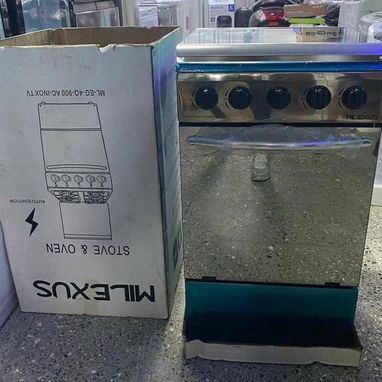 Cocina de gas 4 hornillas y Horno Milexus Encendido Magneto, Tapa de Cristal y Acero Inoxidable Precio $250 USD Transp - Img 124540718