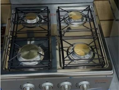 cocina de 4 ornillas con magneto  de meseta y con base 170 y 150 usd - Img main-image