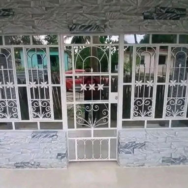 Puertas, ventanas, rejas, barandas y portones. Se realizan trabajos de herrería. - 5/5