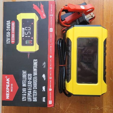 Kit 🔋 BATERÍA DYNESS LiFePO₄ , 12,8 V, 100 A ✅ Energía almacenada: 1,28 kWh + Cargador Inteligente  12V 15A - 7/9