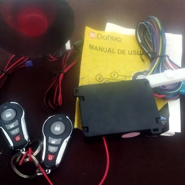 Buena ALARMA contra robos de carros, sensor de impacto, apertura automáticoa de cajuela, 2 llaves de mando a distancia - Img 126243184