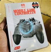 Mando mobile gamer para los amante del video juego en movile el mando es nuevo tiene 4 palancas mire las foto - Img 45791521