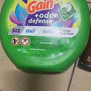 70 cápsulas de detergente Gain 45 usd ( tiene un roto el envase ) lo que no afecta el producto - Img 55794004