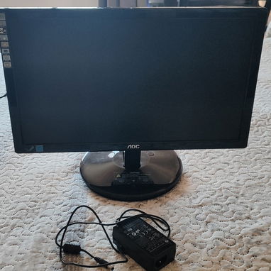 Monitor AOC 21 " de uso con defecto en adaptador - 7/8