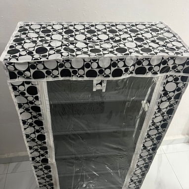 Zapateras de 6 niveles con lona protectora estilo capa. Medidas: 56.5*29*106 cm - Img 106079225