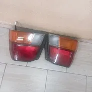 Focos traseros d Toyota Tercel!!! Con intermitente naranja y los bombillos incluidos !! - Img 58034872