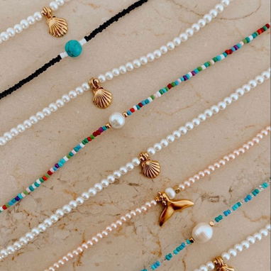 ☀️🌊 ¡El verano ya llegó y tu look playero pide a gritos el toque del mar! 🌊☀️  Collares, tobilleras, pulseras y más - Img 124768370