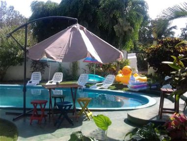 Venta o Alquiler por Tiempo Casa con piscina en propiedad, jardines, frutales, amplias área para siembra y almacenaje - Img 43537177