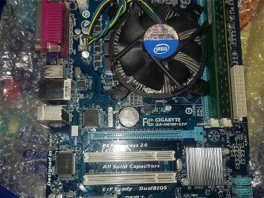 Se vende motherboard de 3ra generación marca Gigabyte GA H61M-S2P con 4 gb de memoria RAM y microprocesador Celeron - Img 68948848