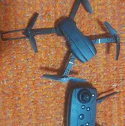 Dron nuevo su estuche . Con 4 baterías de repuesto. Modelo E88 pro - Img 50634497