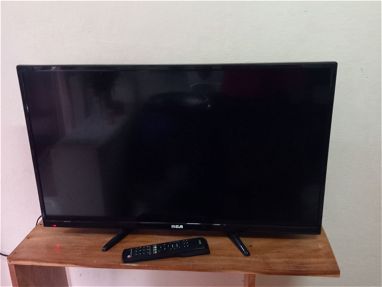 Vendo televisor RCA 32 pulgadas con el multimueble incluido - Img 66455505