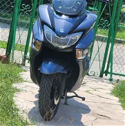 Suzuki burgman 125cc con 4000km caminados papeles de compra no tiene chapa - Img 45922586
