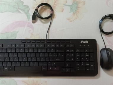Vendo combo de teclado y mouse usb color negro de uso pero en buen estado. - Img main-image