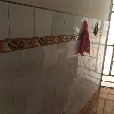 Venta de acogedor apartamento en bajos de un biplanta, 1 habitación  Reparto Modelo, Regla. - 7/10