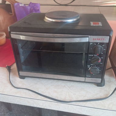 Horno freidora eléctrica de uso de 25/30 lt con plato superior,marca Sankey,funciona todo bien, tiene parrilla y bandeja - 4/10