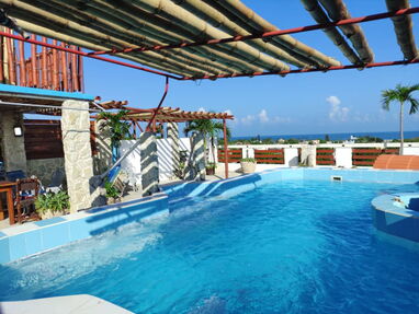 Se renta casa grande y confortable de 5 habitaciones en la playa de guanabo con piscina. 54026428 - Img 30907737