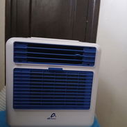 vendo aire acondicionado portatil de 1/4 ton de facil manipulacio e instalación - Img 57704005