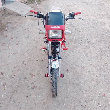 Se vende susuki ax100 con chapa y pacotillas al 100 todo listo para traspaso o poder - Img 123927677
