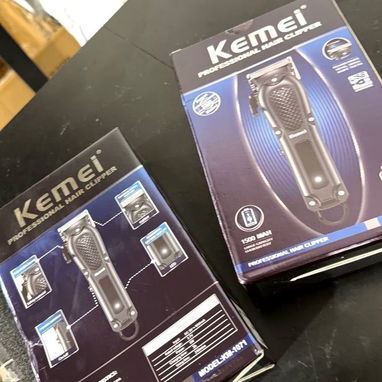 Maquina de pelar kemei 1071 - 2/2