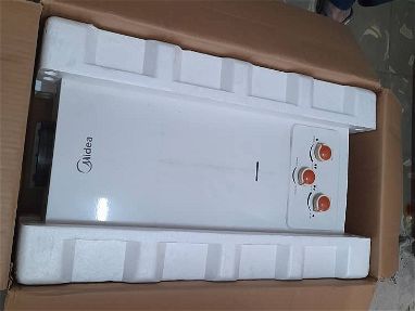 Calentadores de agua nuevos en su caja de 12 Lt/min - Img main-image