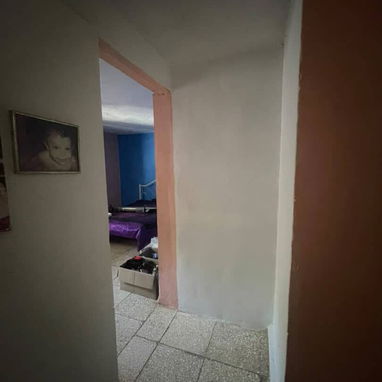 Venta de casa en Boyeros. Frente a la terminal 2.#215 - 4/10