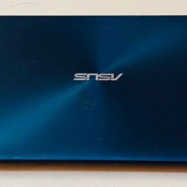 Laptop Asus: Equipo confiable con rendimiento ideal para algunos juegos y trabajos de programación informática. - 4/4