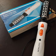 Cepillo eléctrico para garantizar bellos peinados - Img 57685337