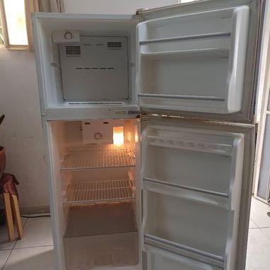 Vendo refrigerador de uso funcionando. Me ajusto - Img 123859045