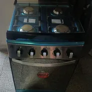 Cocina híbrida marca EON con horno eléctrico y 4 hornillas - Img 57726492